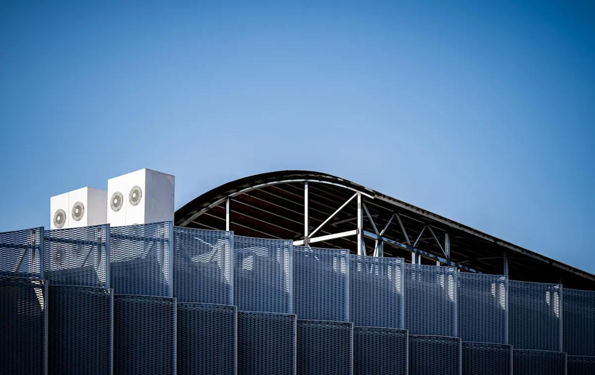 Commercial building rooftop with HVAC units — AI energy optimisation